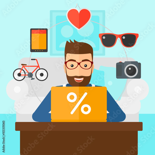 Man shopping online using his laptop.