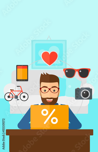 Man shopping online using his laptop.