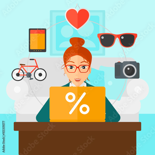 Woman shopping online using her laptop.