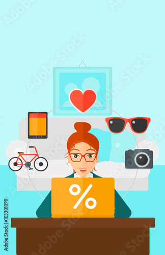 Woman shopping online using her laptop.