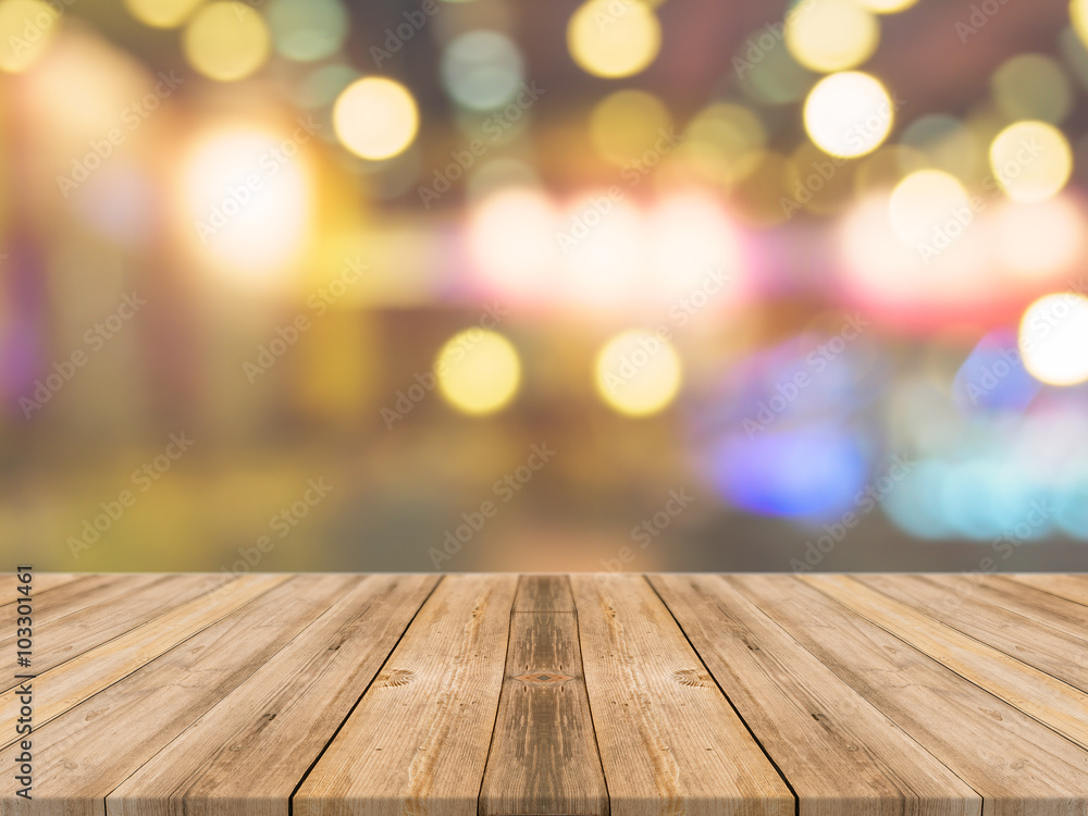 Wooden board empty table in front of blurred background. Perspective brown wood over blur in coffee shop - can be used for display or montage your products.Mock up for display product.Vintage filter. Wooden board empty table in front of blurred background. Perspective brown wood over blur in coffee shop - can be used for display or montage your products.Mock up for display product.Vintage filter.