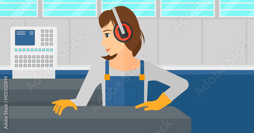 Woman working on steel-rolling mill.