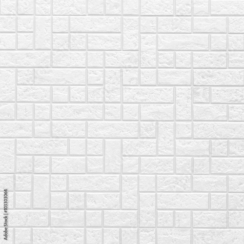 THe modern white concrete tile wall background and texture . .