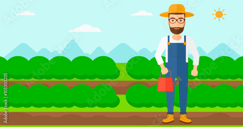 Farmer with watering can.