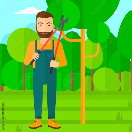 Farmer with pruner in garden.