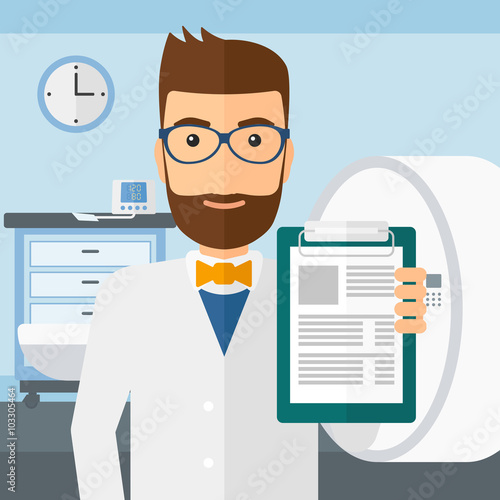 Doctor in hospital room with MRI machine.