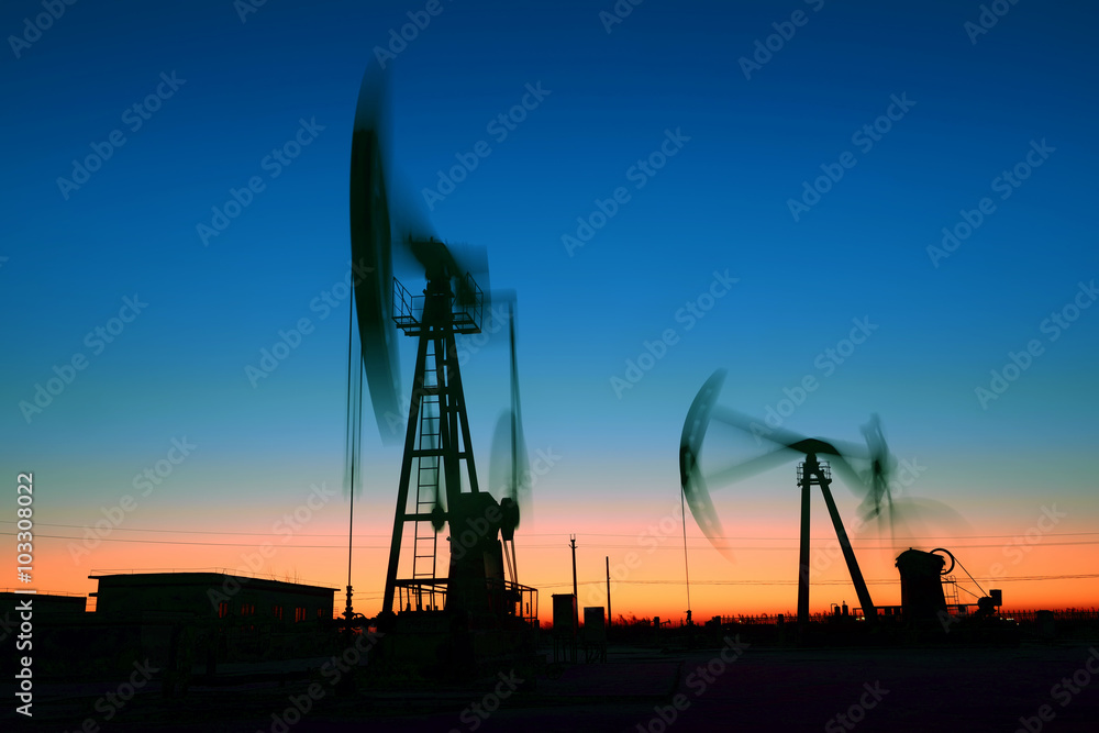 The beam pumping unit is homework, in the fields under the setti The beam pumping unit is homework, in the fields under the setti
