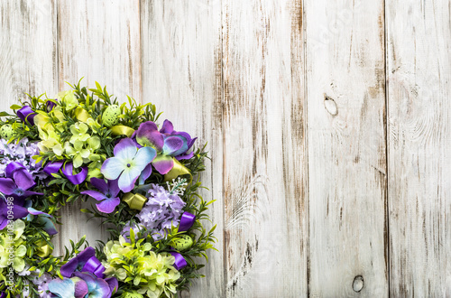 Easter decoration from easter eggs, easter boxwood and flowers.