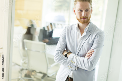 Modern young businessman in...
