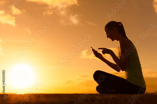 young woman using her smartphone. 