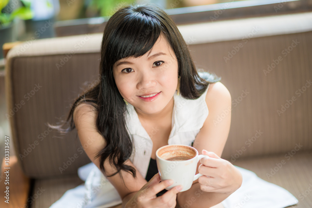Young and pretty woman with coffee Young and pretty woman with coffee