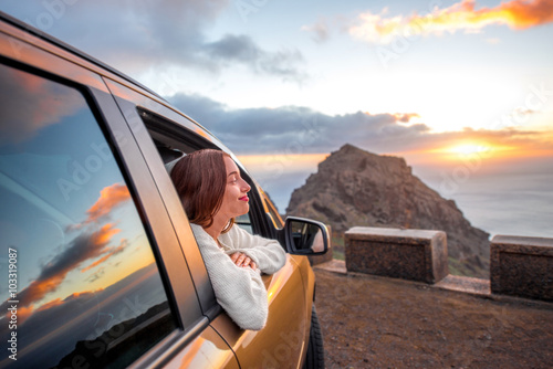 Woman traveling by car on La Gomera island photo