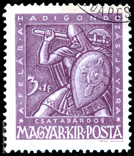 Stamp printed by Hungary, shows shows warrior with shield and ba