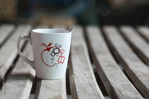 a Cup of coffee on wooden table