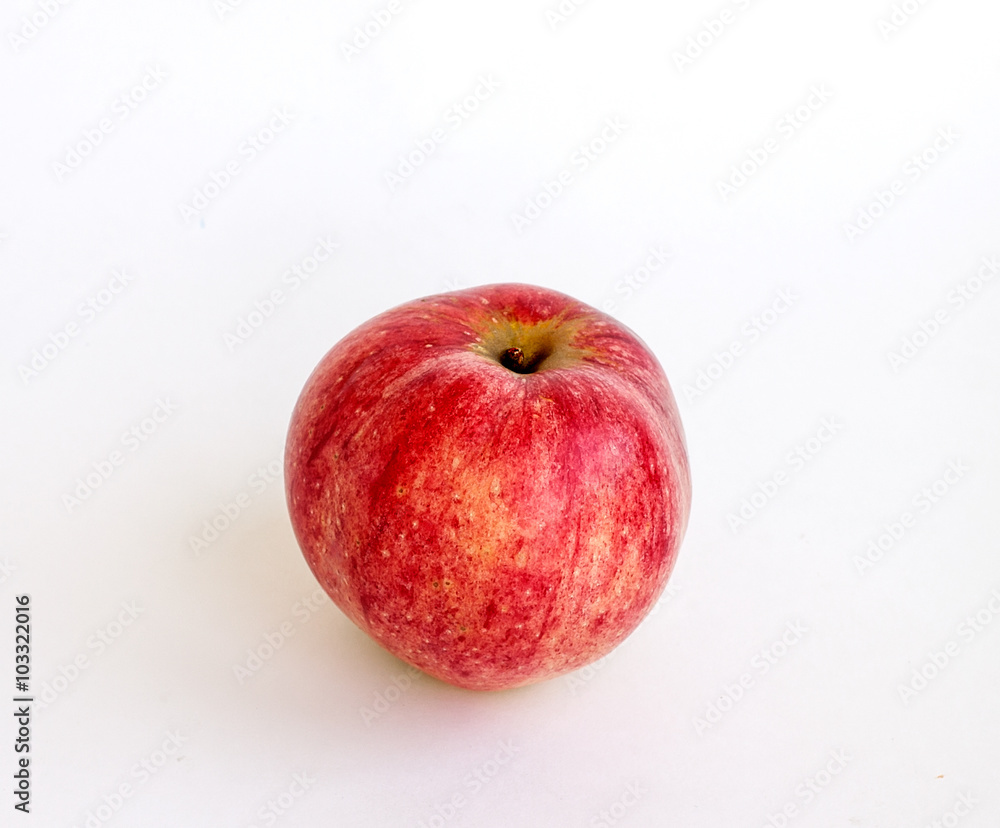 Ripe summer red apple on a white background Ripe summer red apple on a white background