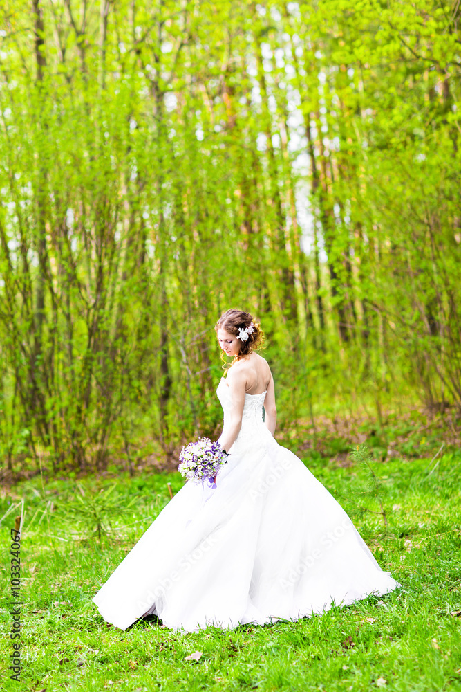 Wedding. Beautiful bride with bouquet