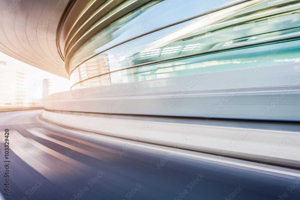 Car driving on road in city background, motion blur Car driving on road in city background, motion blur
