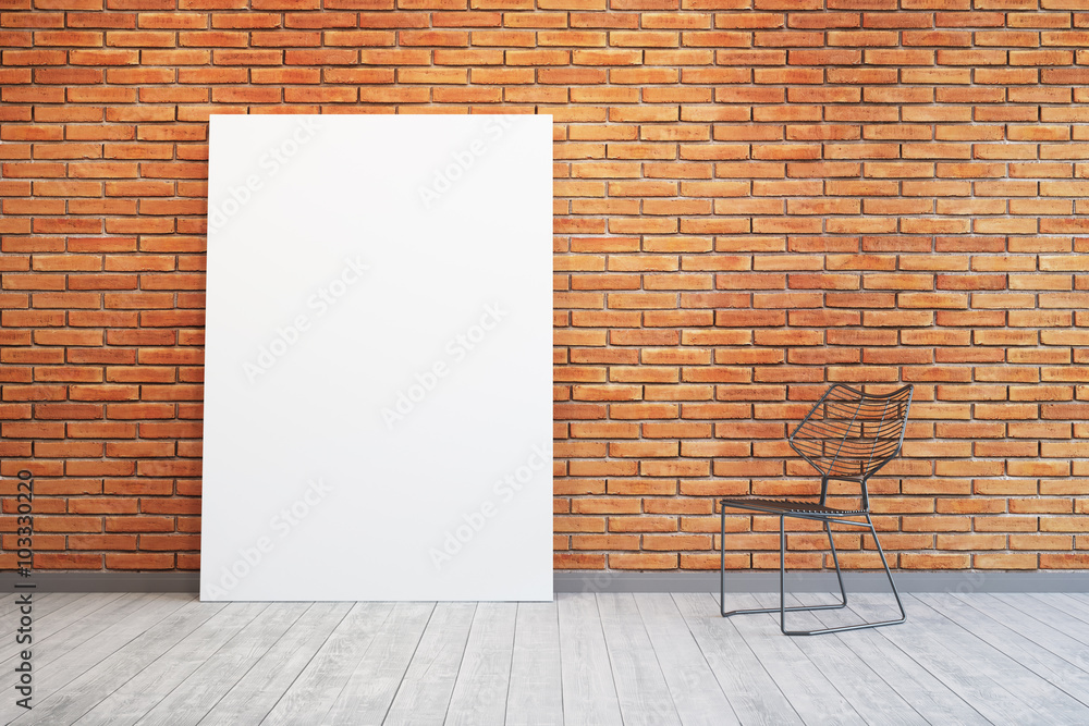 room with blank picture and chair room with blank picture and chair