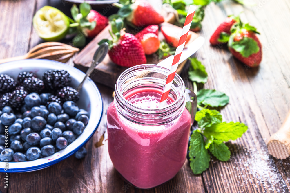 Well being and weight loss concept, berry smoothie. Well being and weight loss concept, berry smoothie.