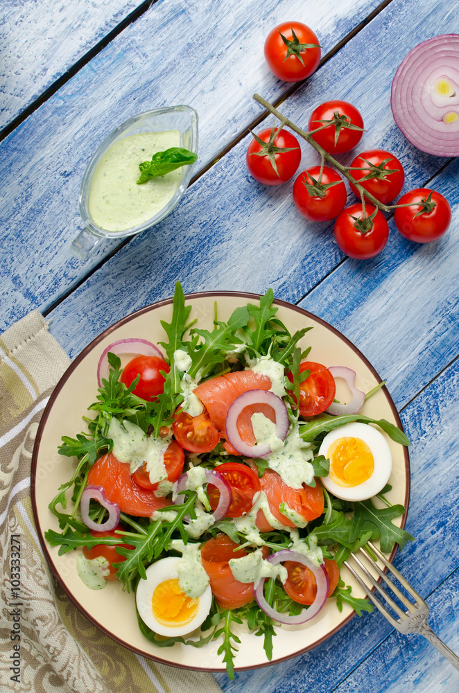Smoked salmon salad with arugula, tomatoes, eggs and red onion Smoked salmon salad with arugula, tomatoes, eggs and red onion