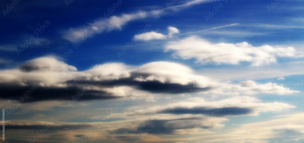 dramatic clouds on blue sky background dramatic clouds on blue sky background