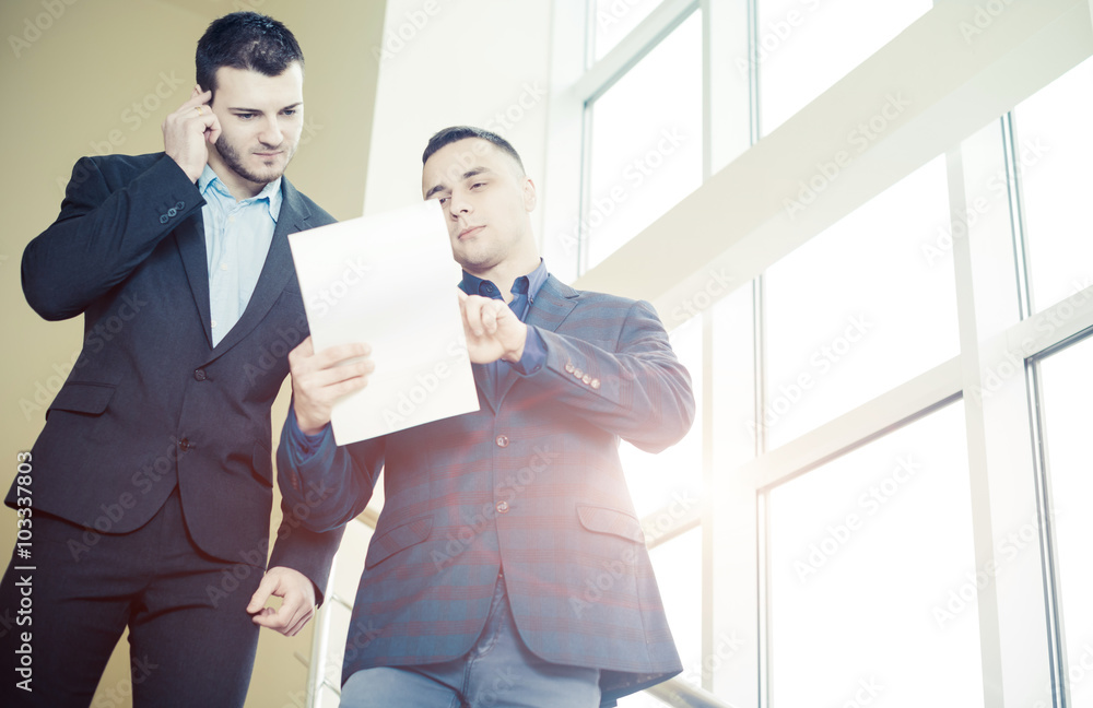 manager showing document to partner manager showing document to partner