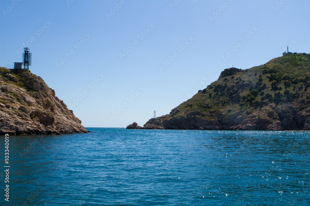 Fototapeta premium Sea landscape with rocks on shore,