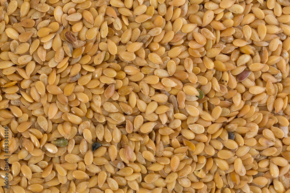 Close view of organic golden flaxseed Close view of organic golden flaxseed