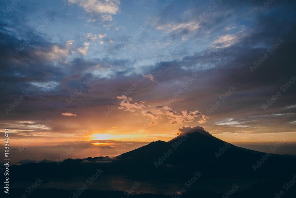 sunrise overlooking the volcano, the cloud over the volcano
