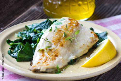 Fotografie Fish dish -  fish fillet with chard