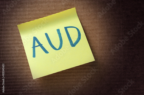 AUD acronym (Australian Dollar) on yellow sticky note