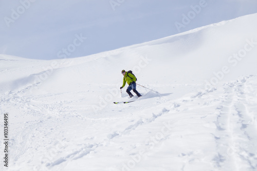 skier going down of a mountain