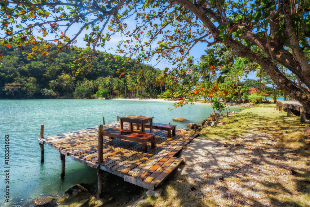 Tropical island, tables on the beach. Thailand. Koh Ngam.