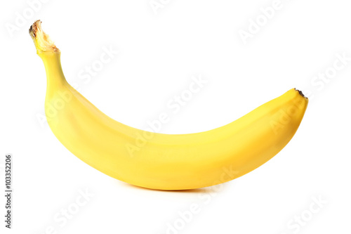 Single banana isolated on a white