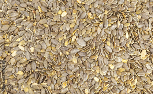 Close up picture of pumpkin seeds, food background