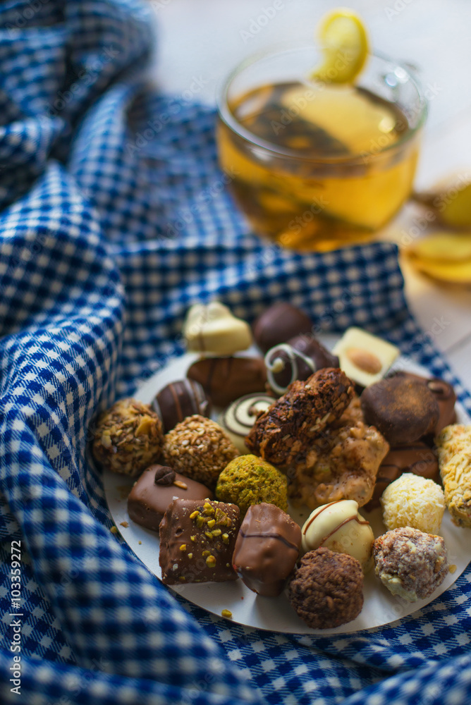 Ginger tea lemon and cinnamon with chocolates Ginger tea lemon and cinnamon with chocolates