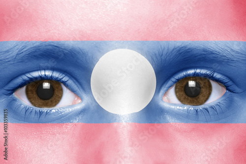 human's face with laotian flag