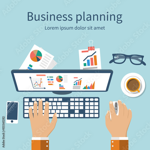 Businessman analyzing financial statistics at his workplace. Bus