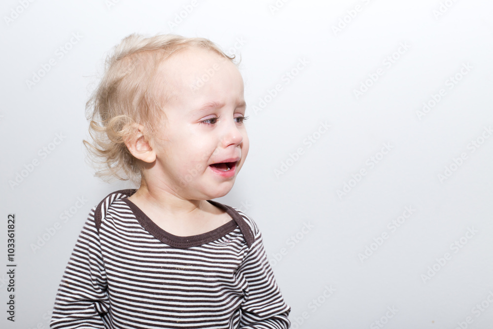 Naklejka premium Portrait Of Crying Baby Boy In Home