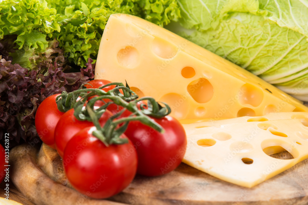 yellow cheese with fresh vegetables yellow cheese with fresh vegetables