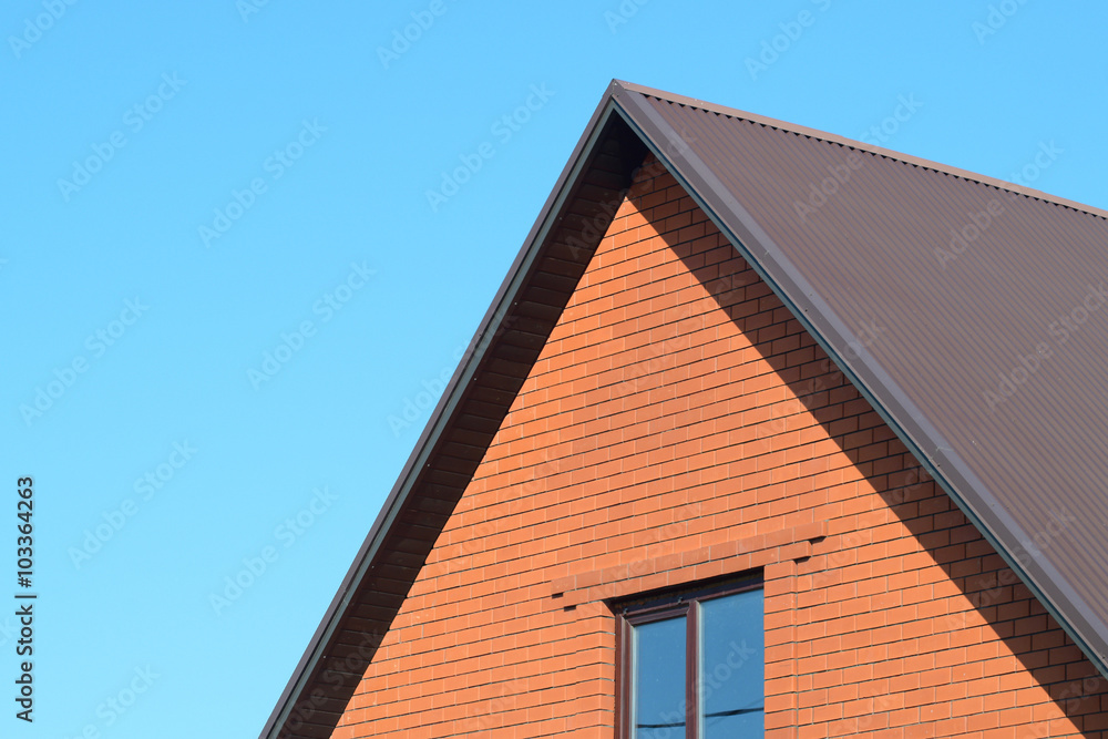 House with a roof made of metal sheets