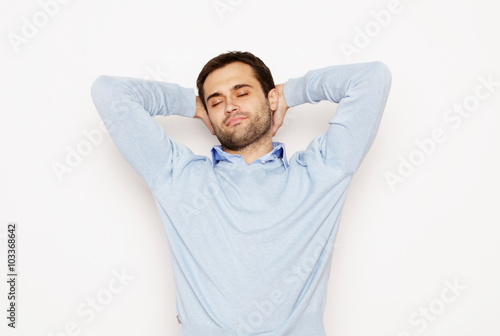 happy young man in blue shirt. 