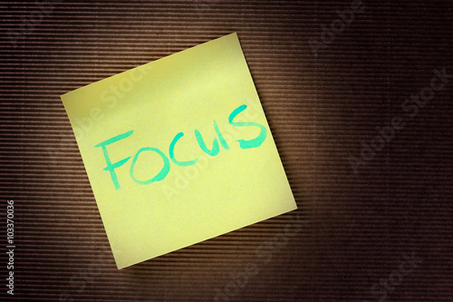 focus text on yellow sticky note