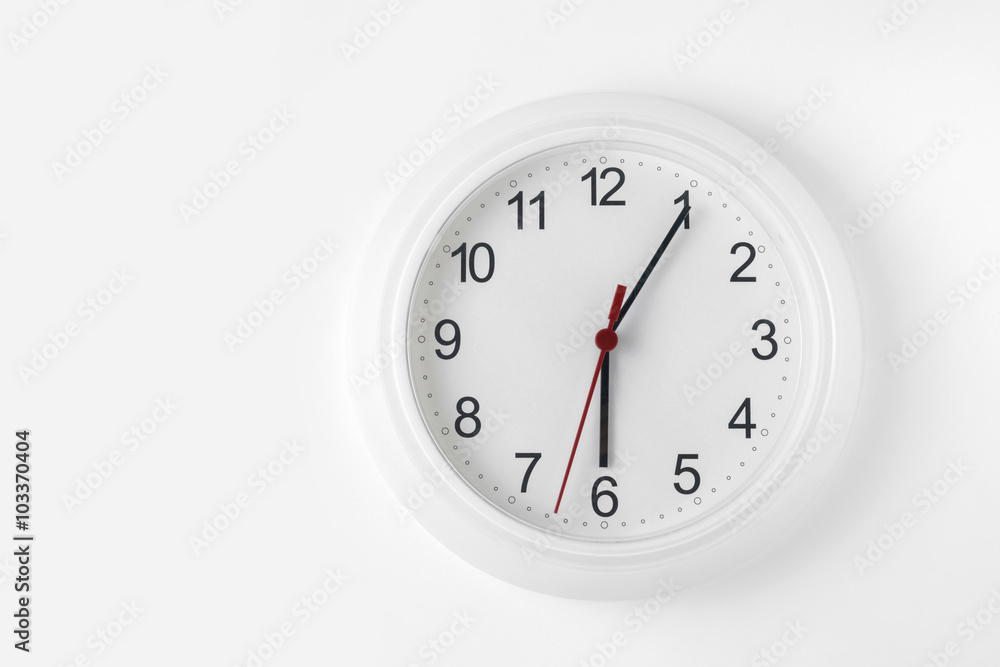 clock on white wall clock on white wall