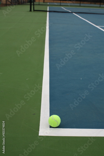Tennis Ball on Blue Green Court at Edge Corner © cpcthatsme