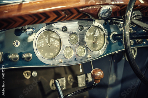 Blue dashboard of a vintage car