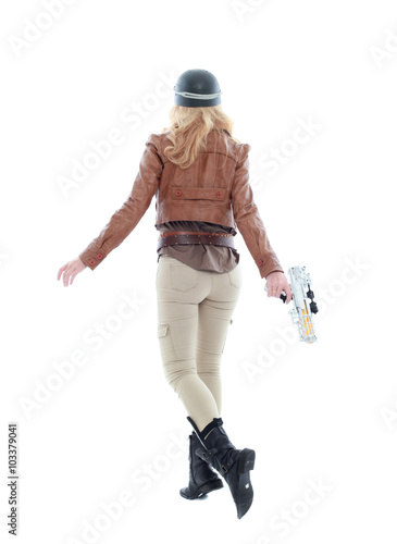 young blonde woman in a steampunk outfit, action hero pose. isolated on white background. © faestock