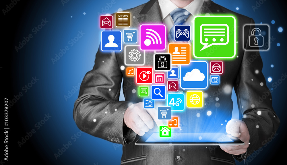 Business man using tablet PC with social media icon set Business man using tablet PC with social media icon set