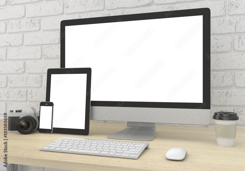 Fototapeta premium Responsive mockup screen. Monitor, tablet, phone on table in office.