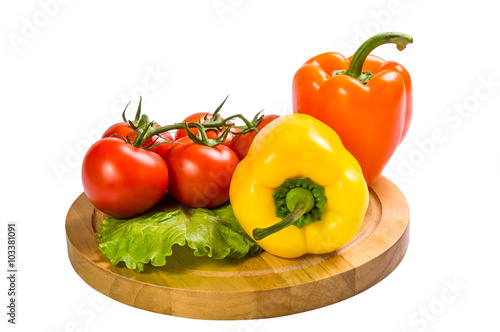 Colored paprika and tomatoes isolated